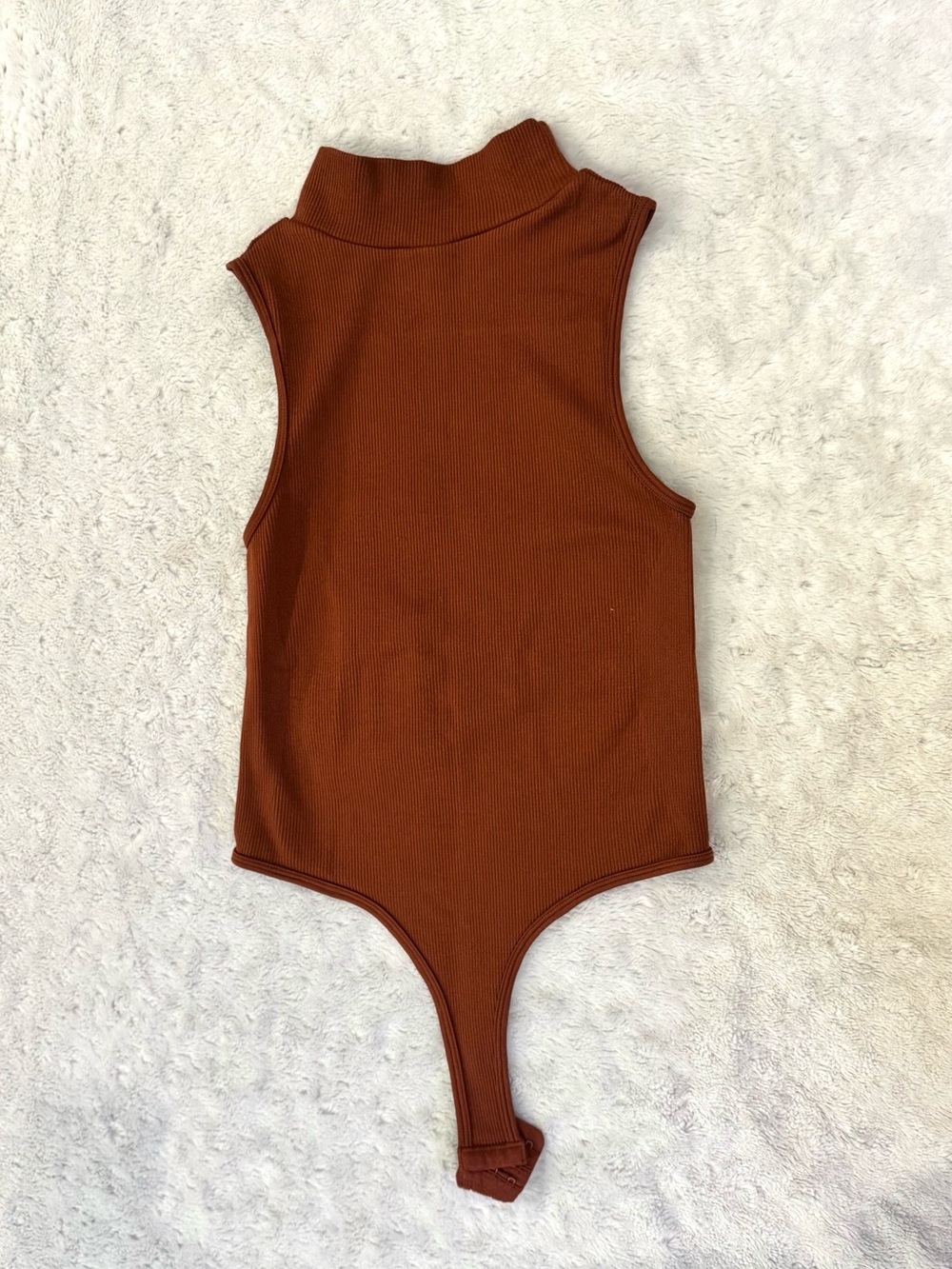 DYNAMIC Ribbed Sleeveless Turtleneck Bodysuit in Rust